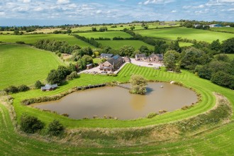 Farmhouse and holiday cottages on Lask Edge Road, Biddulph